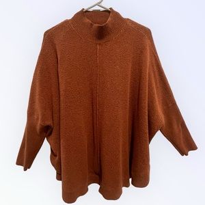 Terracotta color turtleneck poncho style sweater great condition size XL.
